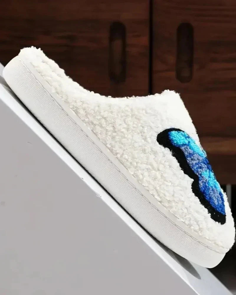 Nadýchané pantofle s motýlem