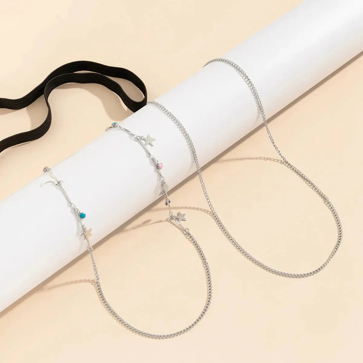 Stehenní šperky s motivem hvězdy a měsíce