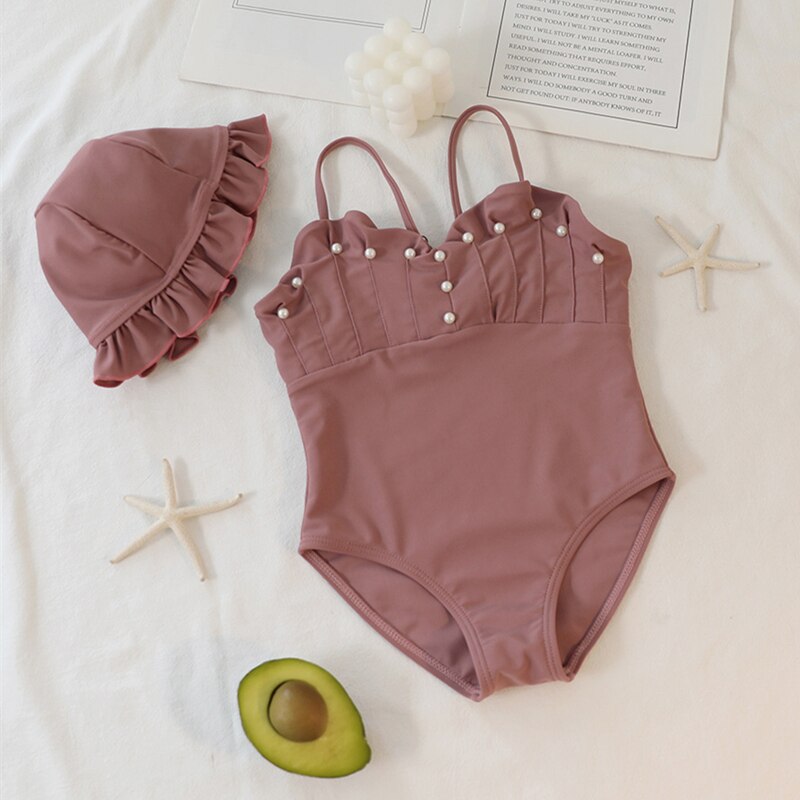 Jednodílné plavky s perlami a kloboukem pro dívky