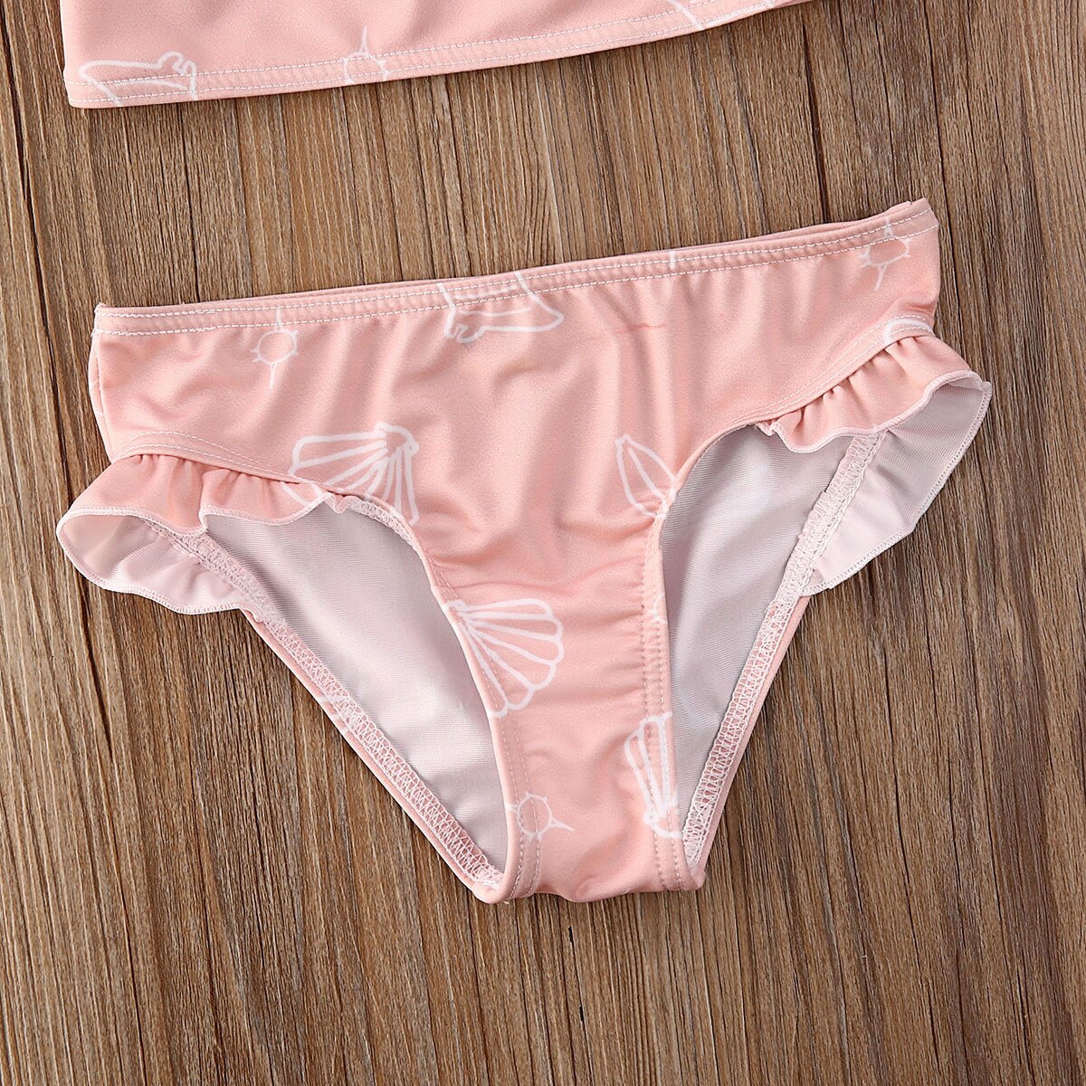 Dvoudílné dívčí plavky s mušlovým vzorem