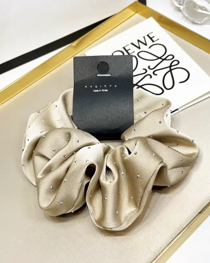 Gumička do vlasů s třpytivými částicemi