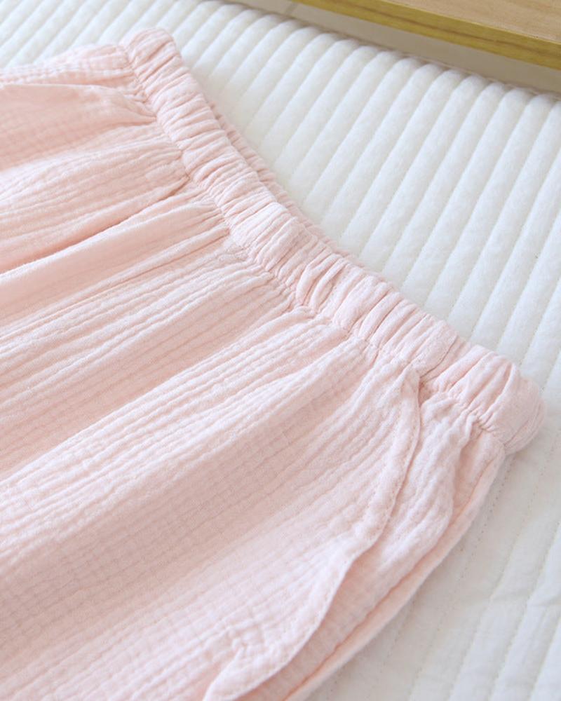 Dlouhé volné mušelínové kalhoty s volánky