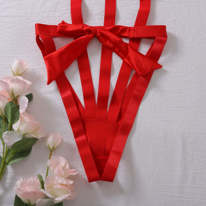 Body s nastavitelnými ramínky a mašlí na hrudi