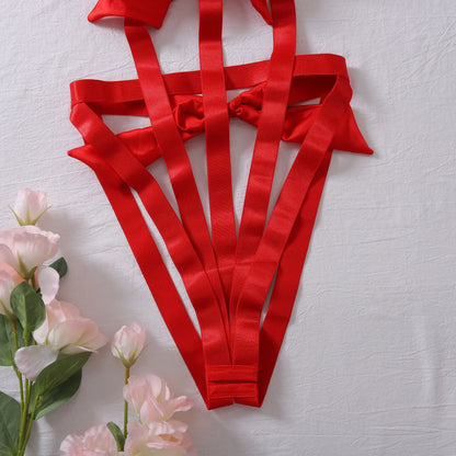 Body s nastavitelnými ramínky a mašlí na hrudi