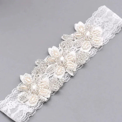 Krajkový podvazek na stehna s květinovým motivem