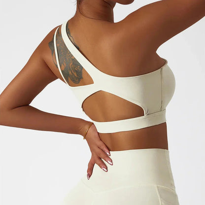 Sportovní podprsenka na jedno rameno s ozdobnými ramínky