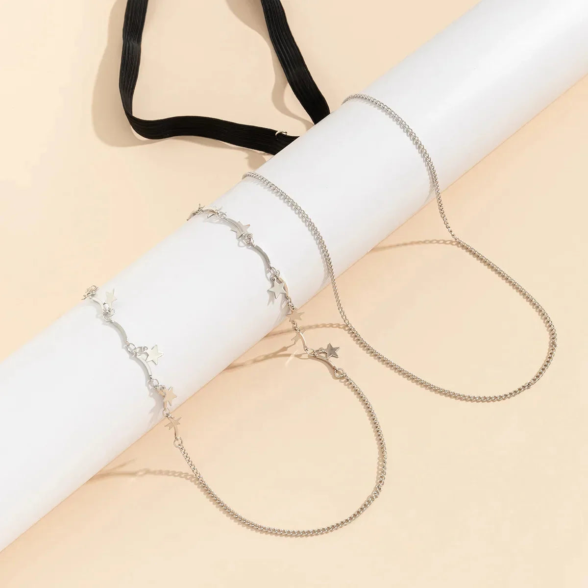 Stehenní šperky s ozdobnými hvězdami