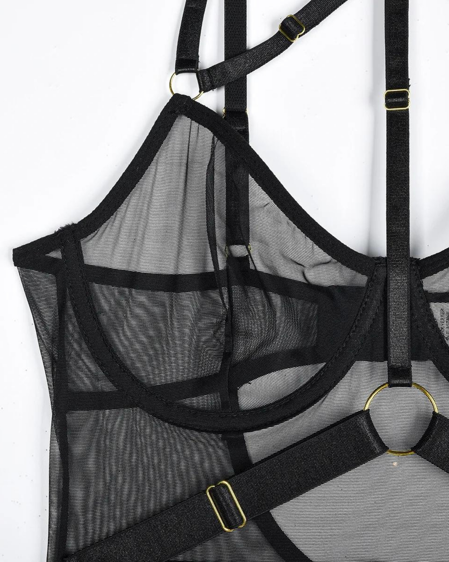 Průsvitné body s ramínky na stehnech