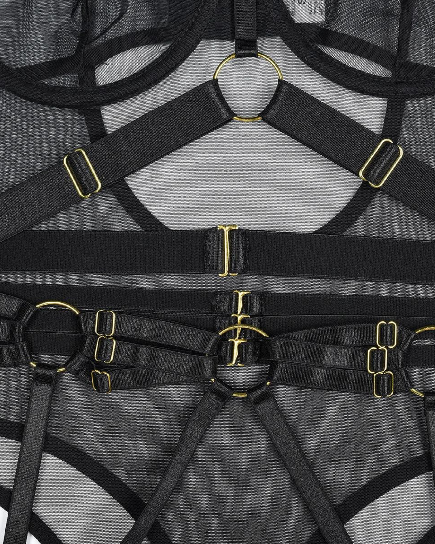 Průsvitné body s ramínky na stehnech