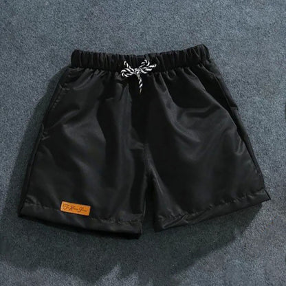 Pánské plavecké kraťasy s nášivkou