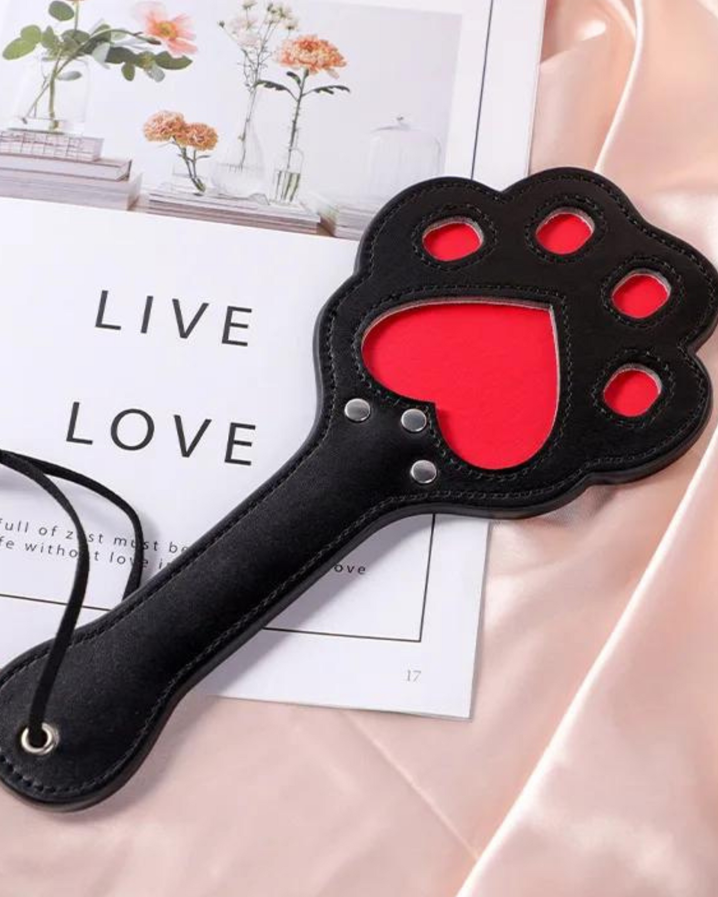 Plovák s nastavitelnou rukojetí a motivem tlapky