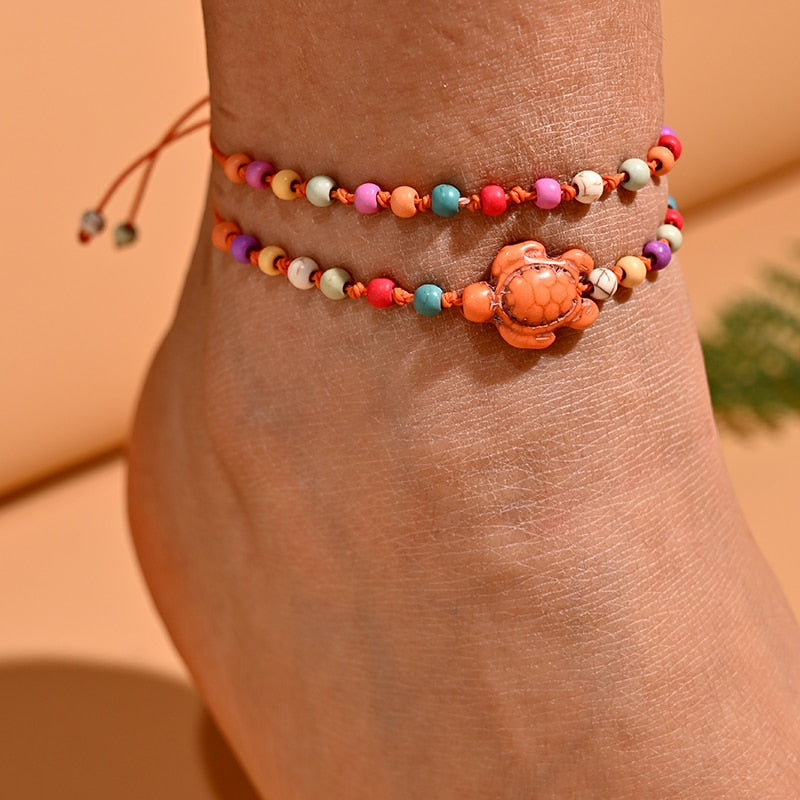 Sada dvou náramků na kotník s motivem želvy