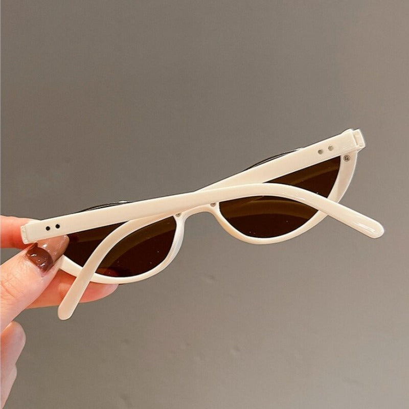 Dámské sluneční brýle nepravidelného tvaru