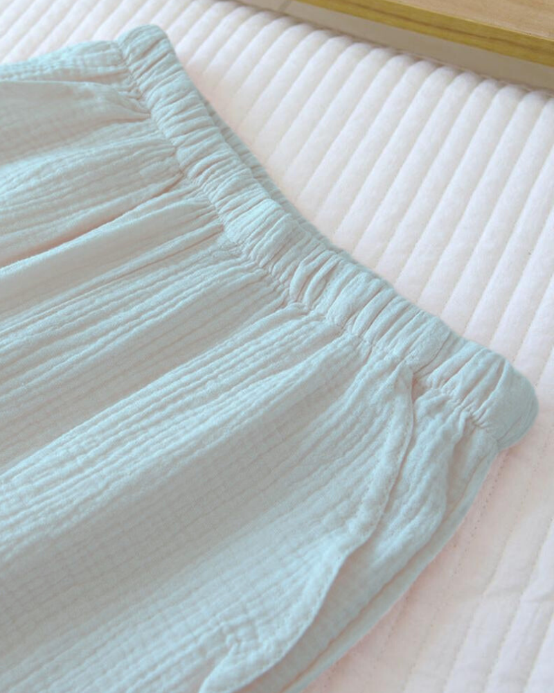 Dlouhé volné mušelínové kalhoty s volánky