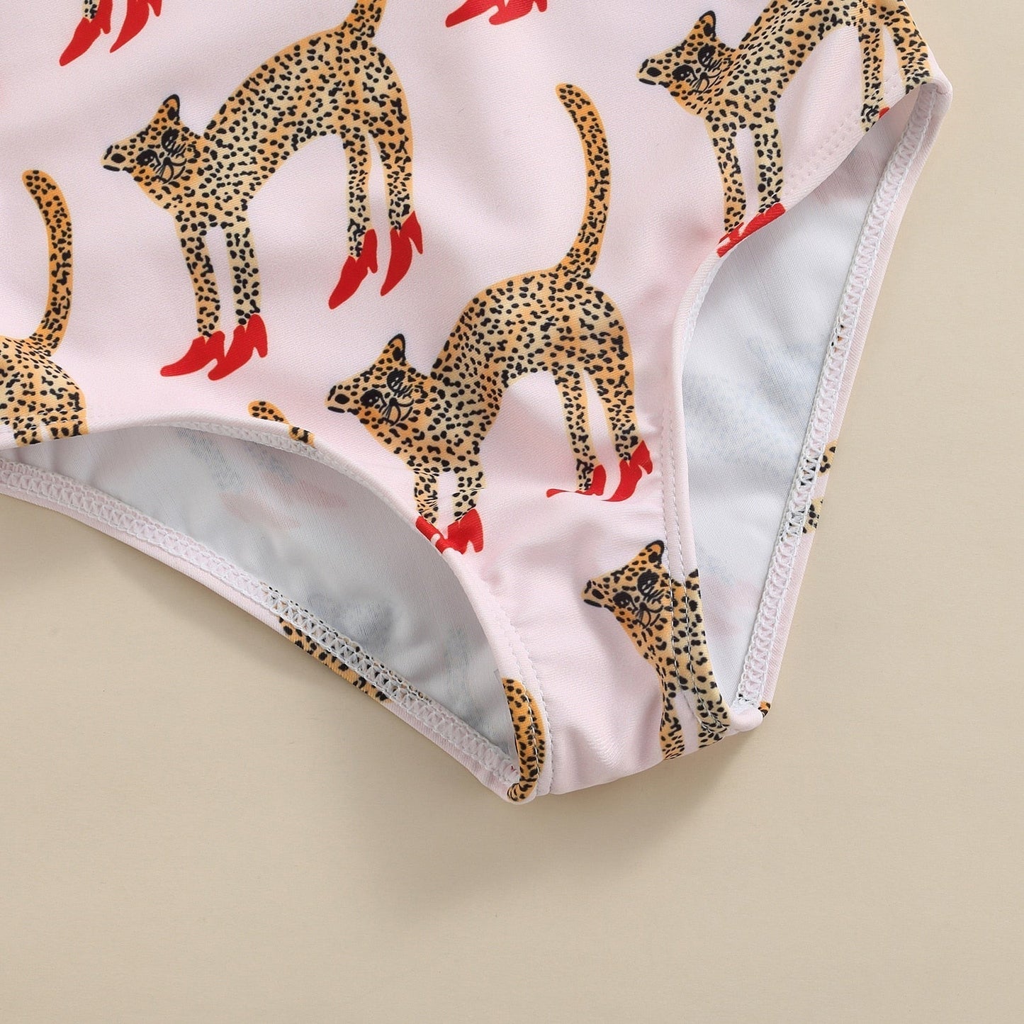 Jednodílné plavky s leopardím vzorem pro dívky