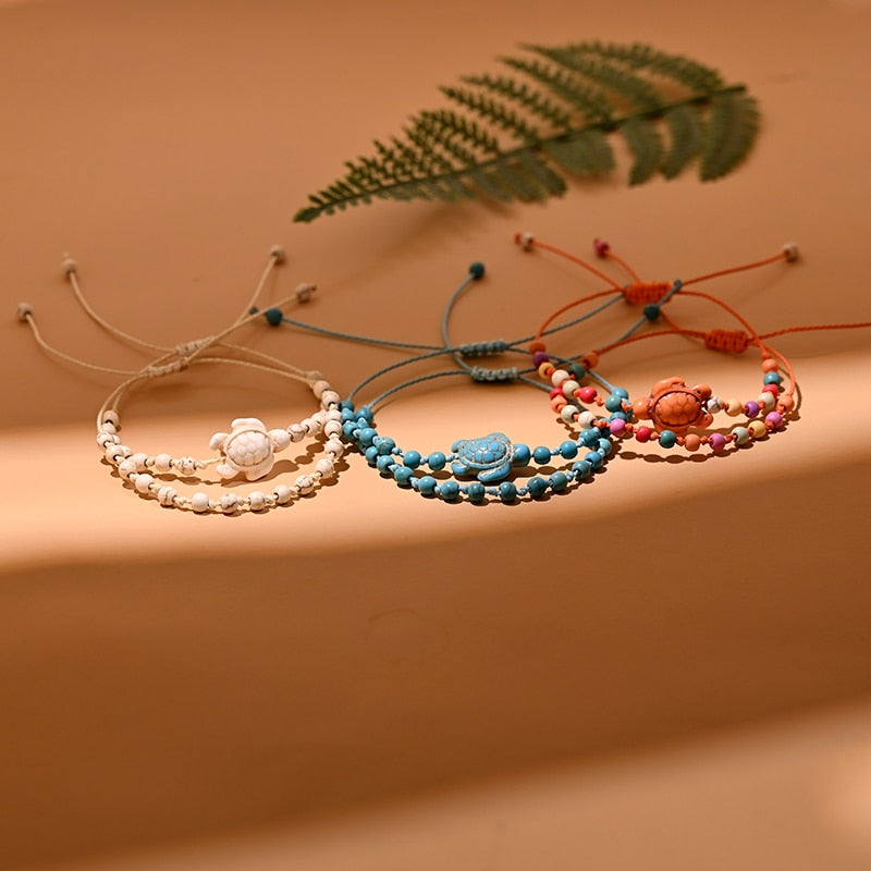 Sada dvou náramků na kotník s motivem želvy