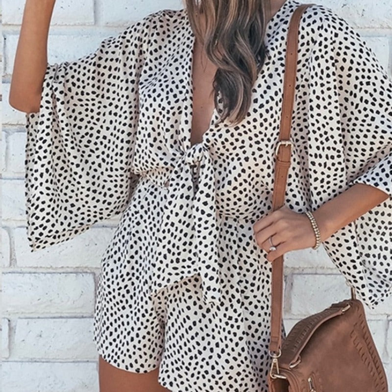 Elegantní overal s dlouhým rukávem a zavazováním