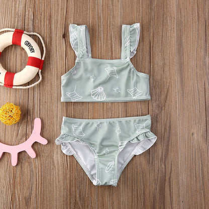 Dvoudílné dívčí plavky s mušlovým vzorem